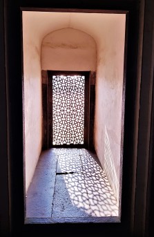Sunlight filtering through marble lattice at Humayun's Tomb